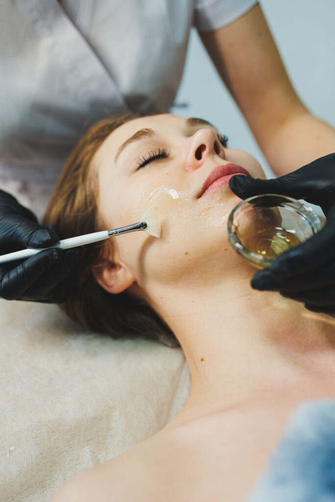 A woman with a mask on her face. Facial skin care. A woman's face with an organic mask